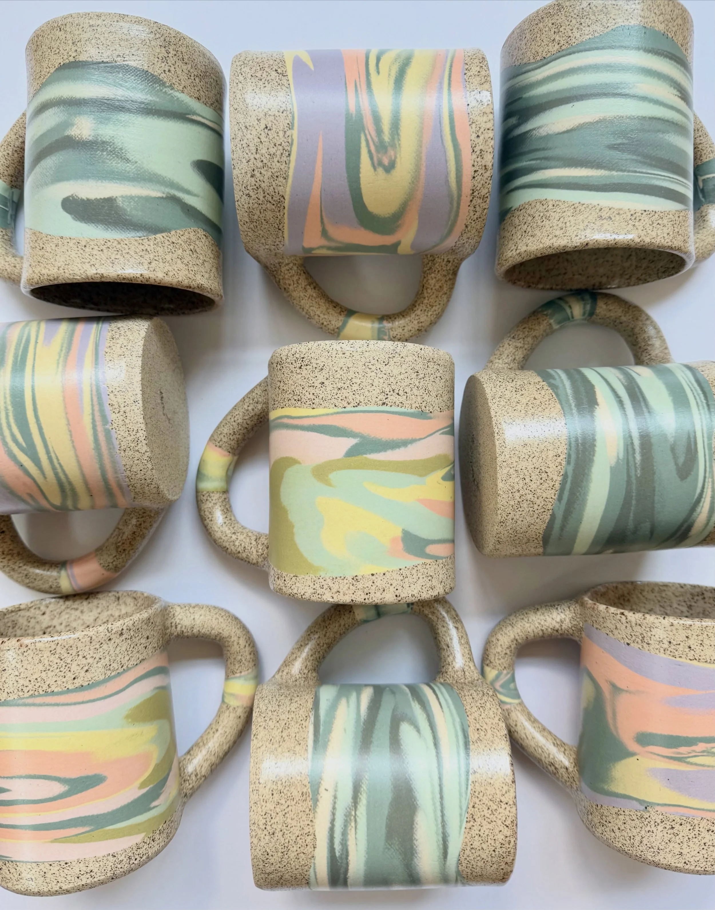 I&rsquo;ve been working on more swirl🌀versions of my OLA mugs sans gold luster ✨ (this is for all y&rsquo;all who love your microwave 😂) 
Always more development and exploration with this hand-built colored clay nerikomi design after years and year