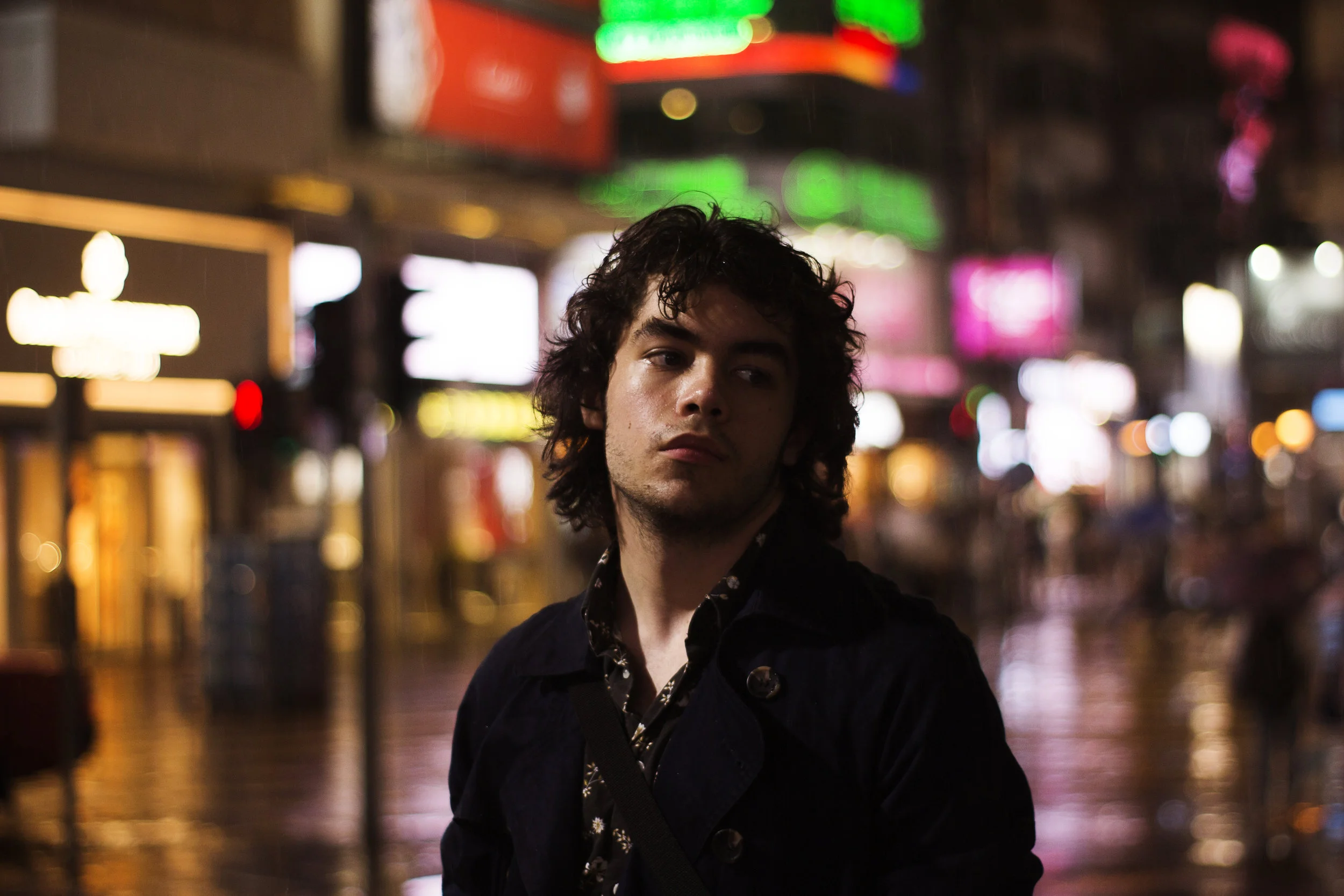 “Liam”My best friend and leading man for my work. At the time, I had started using the 50mm prime lens more frequently as well as dwelling into night photography. At one of my usual spots in Causeway, I snapped this pic of Liam posing during a rainy…
