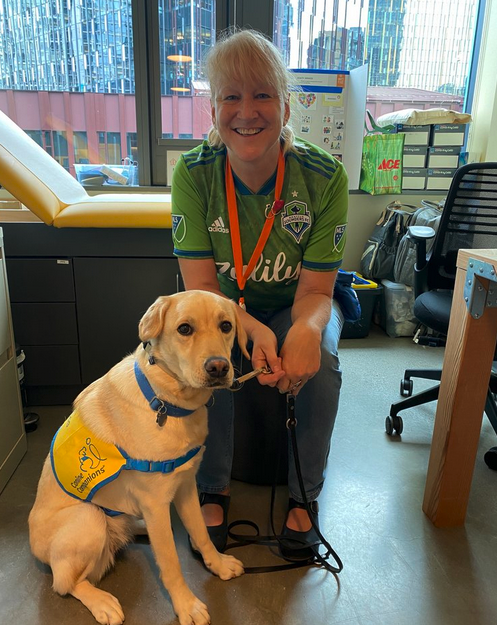 Latte brings lots love to families and staff at Mary's Place!