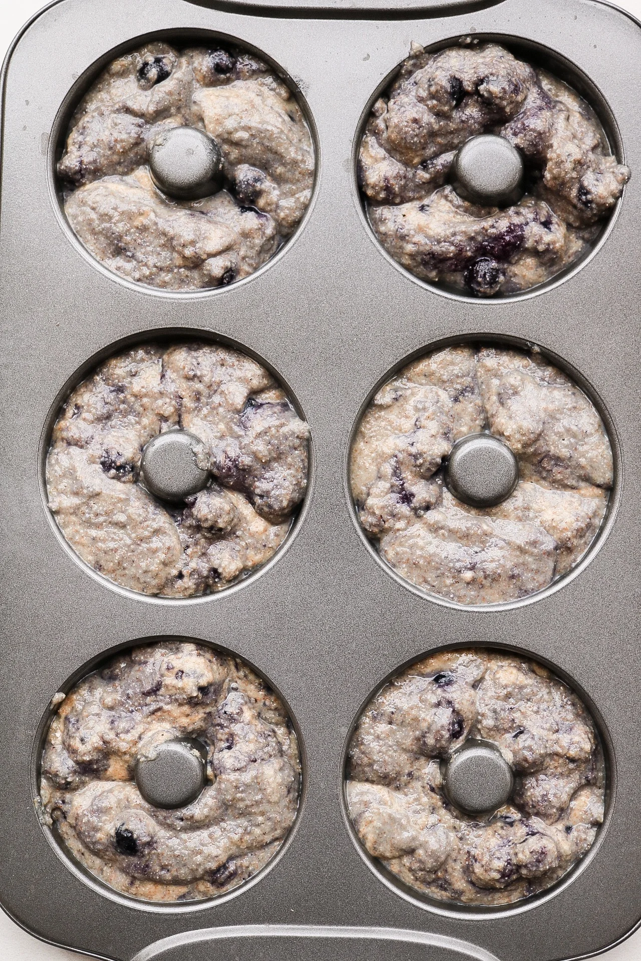 Fill up your donut pan and bake these bad boys for about 20 minutes!