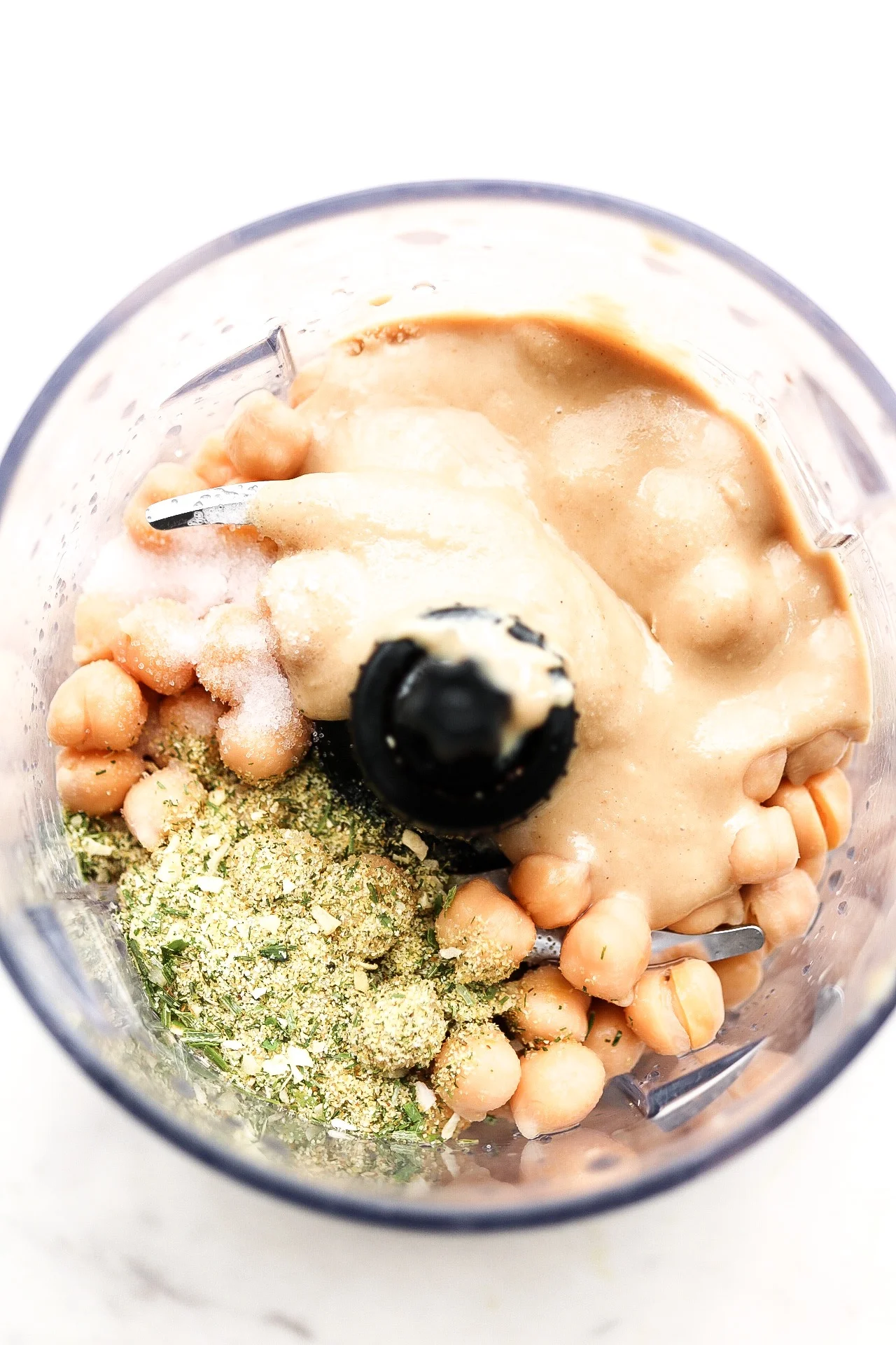 Just place all of your ingredients in the food processor!