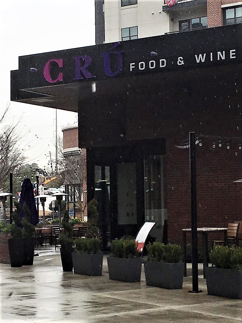 Exterior photo of Cru wine bar in Battery Park Atlanta
