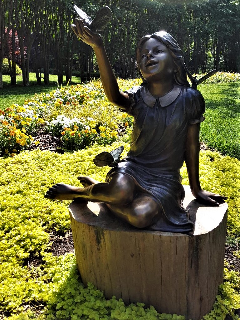 Little girl sculpture at Gibbs Gardens
