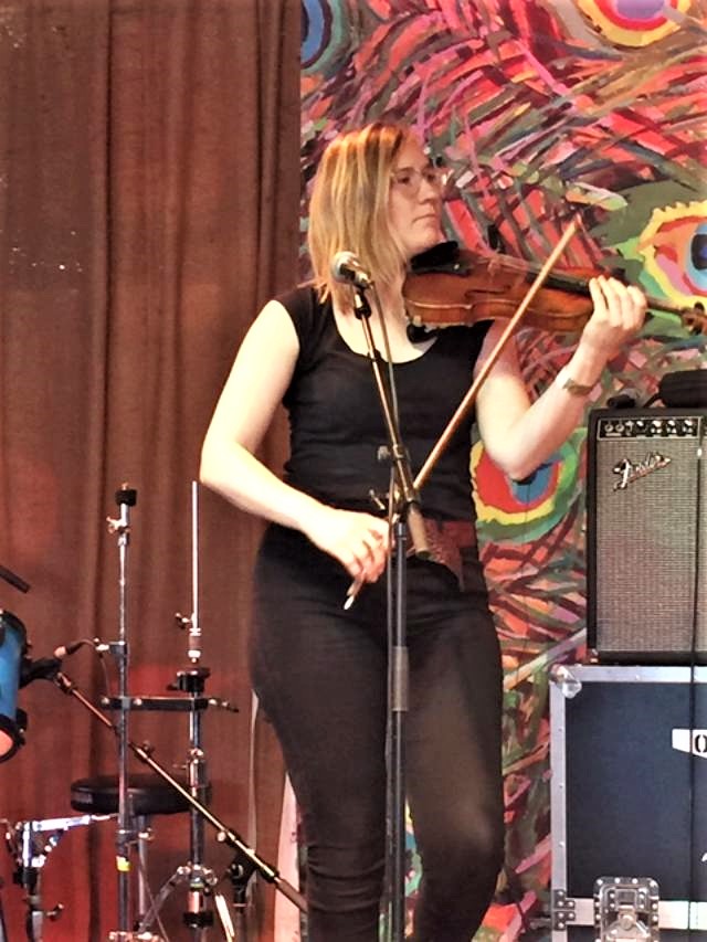 Fiddle player on stage