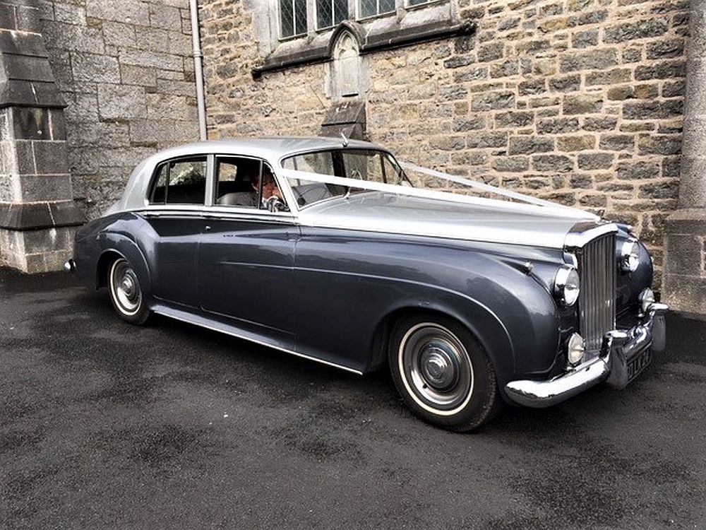 A classic car waiting on the wedding party in Adare, Ireland