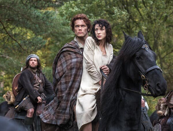 Claire and James Fraser riding together