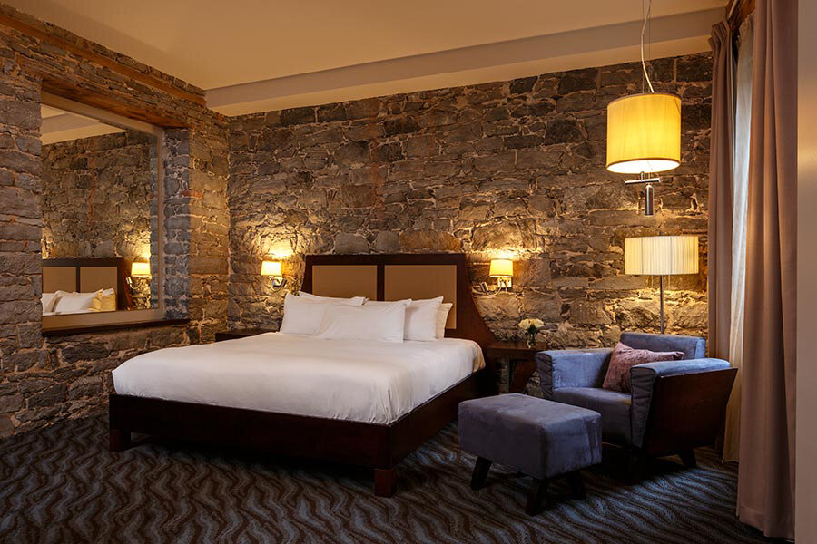 Rustic charm in guestrooms at Hotel Nelligan in Montreal, Quebec