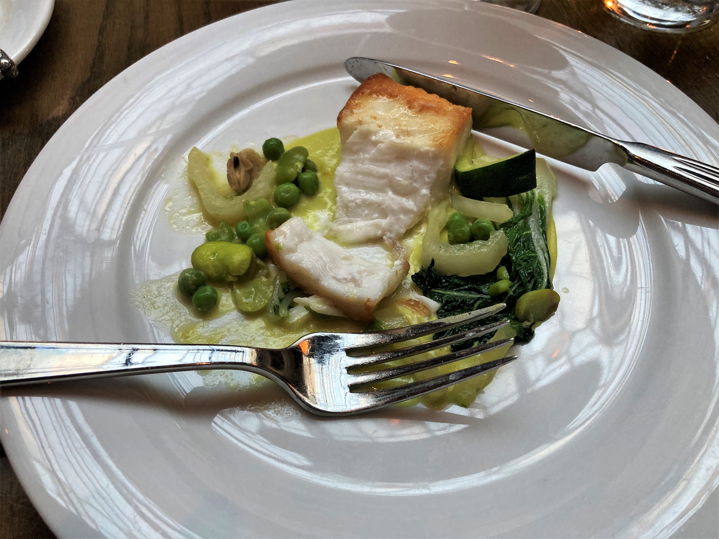 Wreckfish with peas and squash