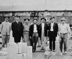 Colonel Tate at the quarry with foremen