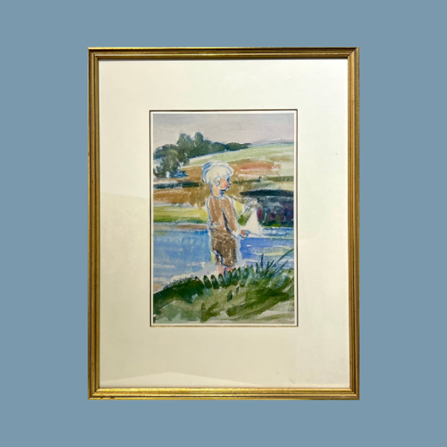 Boy holding pond boat