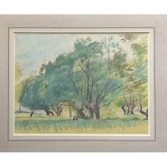 Figure in tall grass under trees