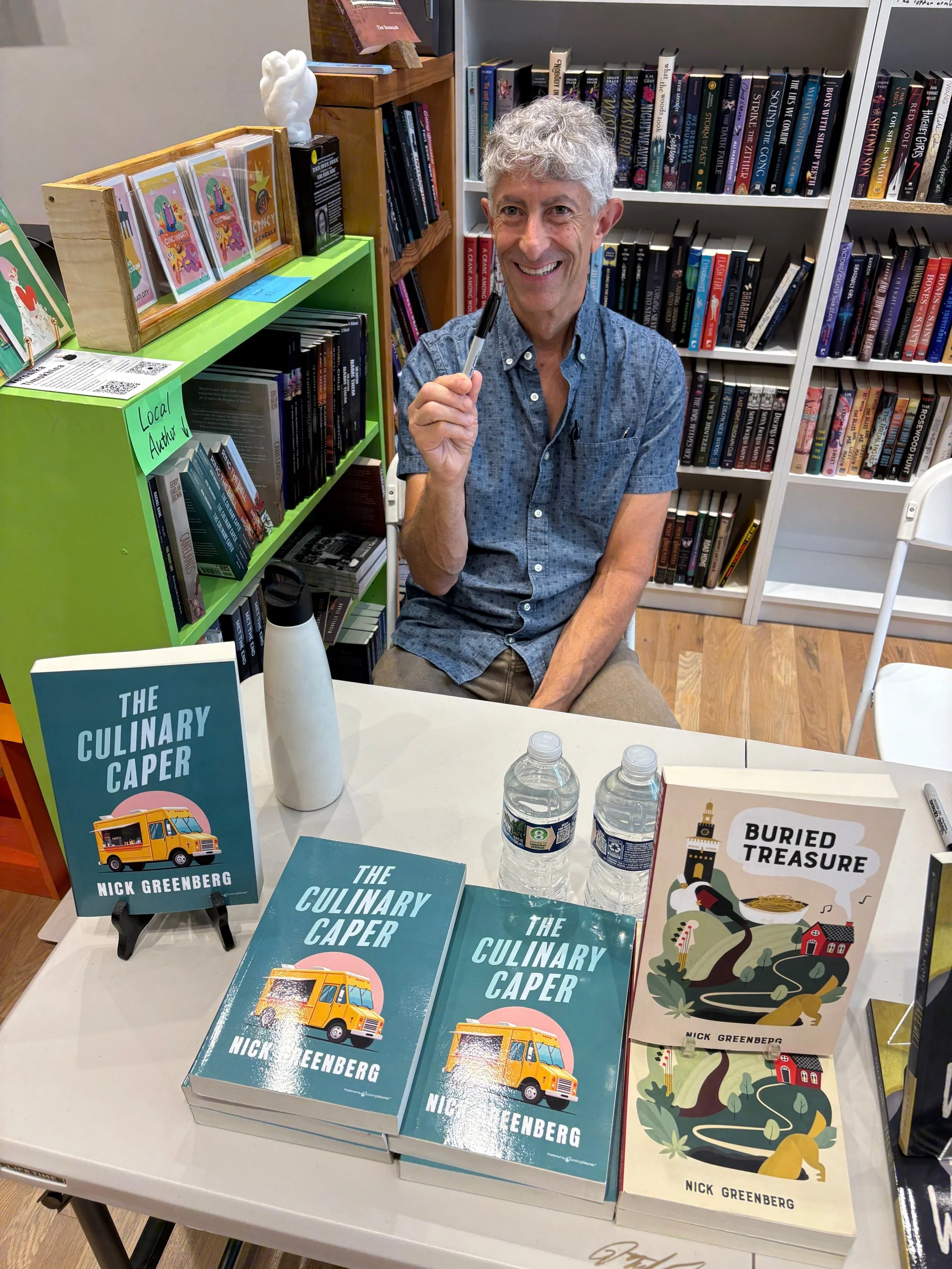 Author at book signing table