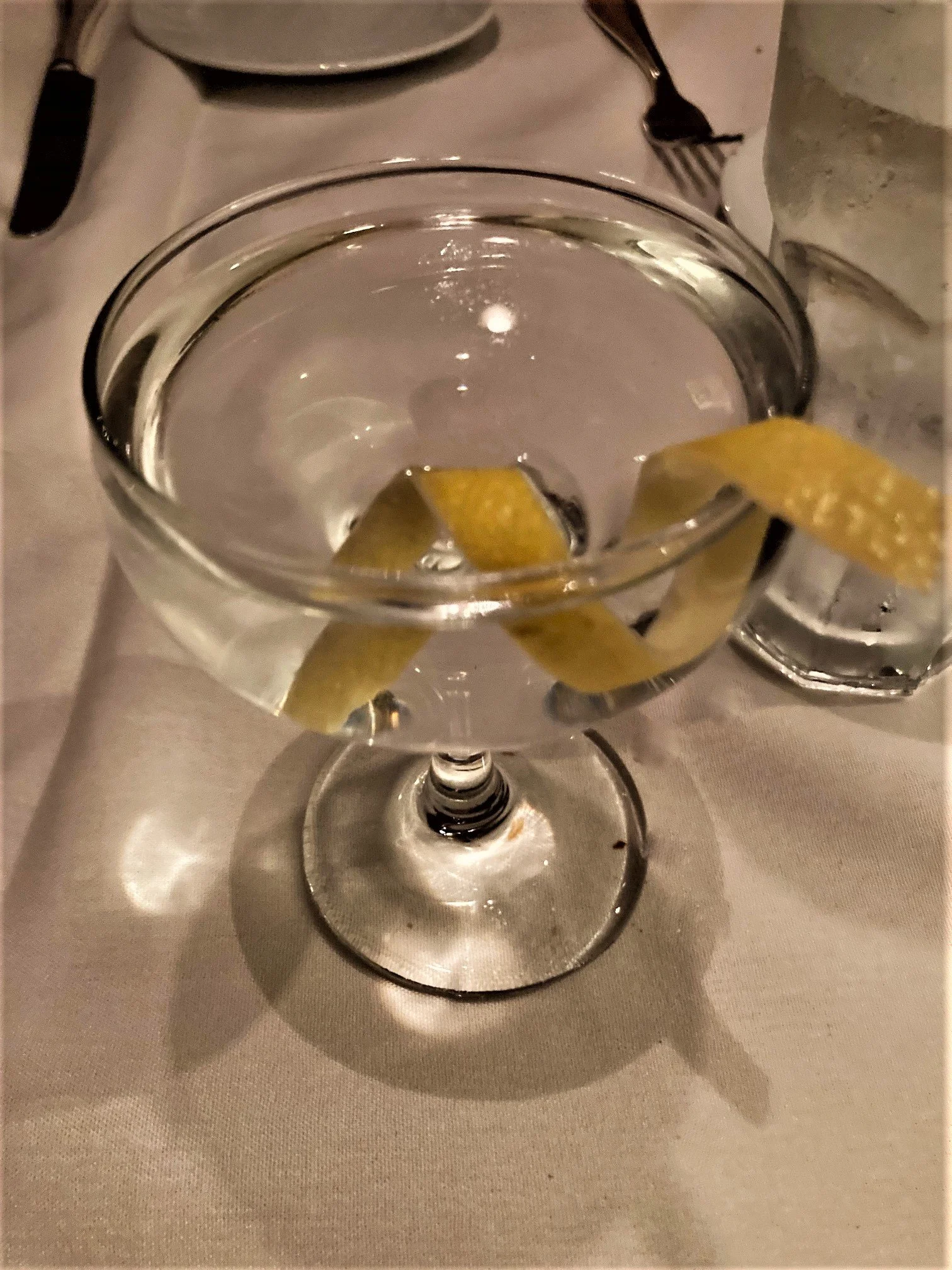 Perfect martini with lemon twist