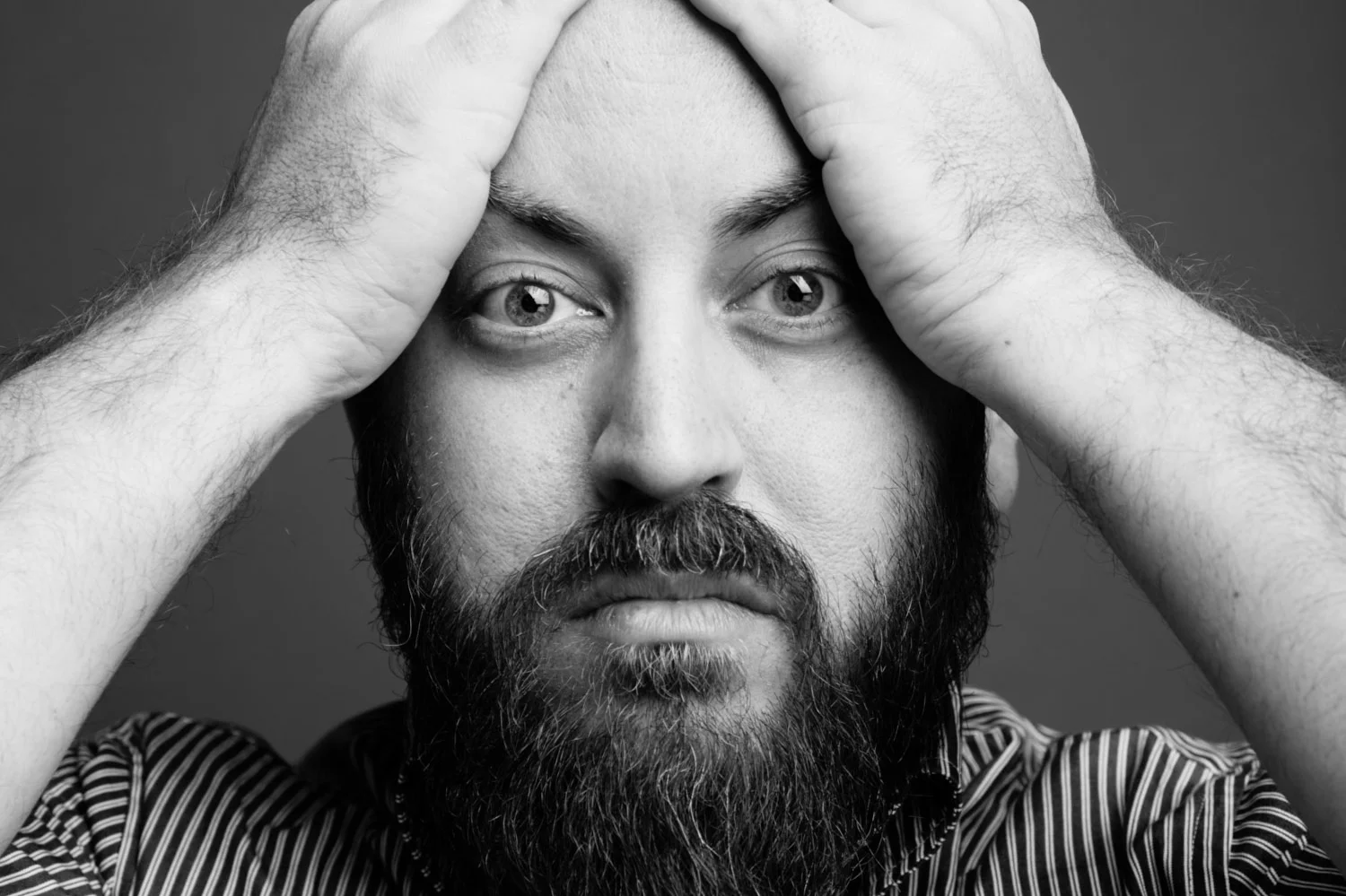 Portrait by John Midgley.