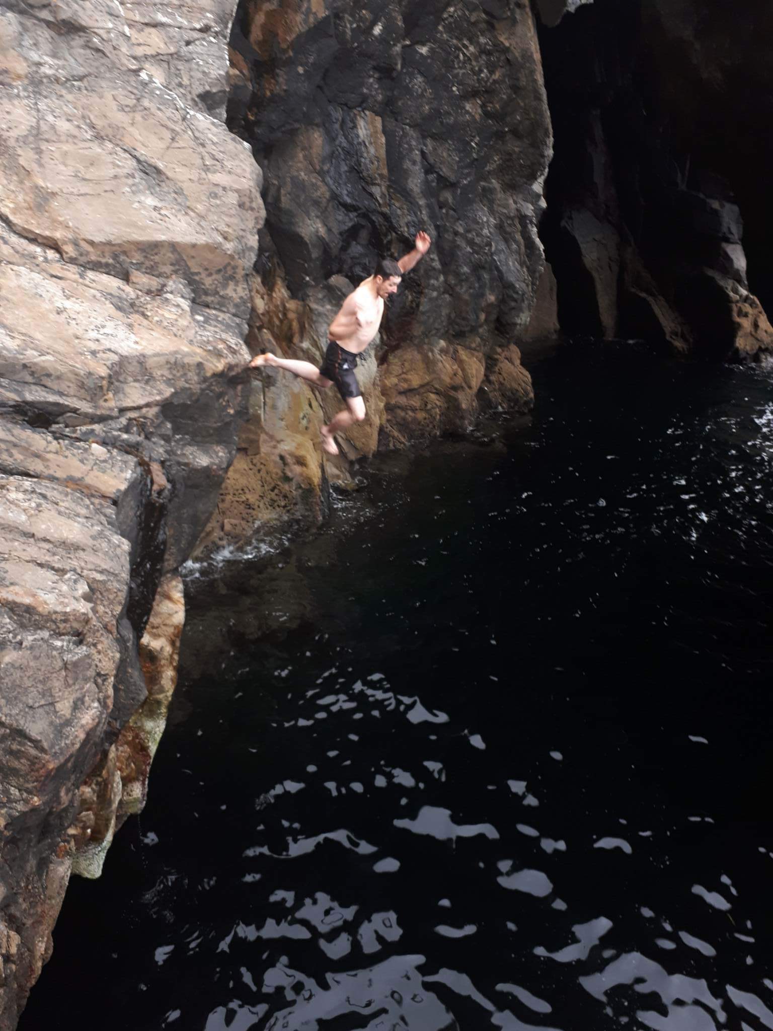 Kyle continuing his descent beyond the base of Sail Rock, hot on the trail of his phone