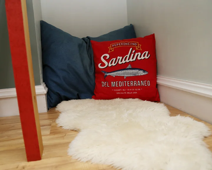 Lots of pillows and a soft rug can be moved around the room for additional lounging.