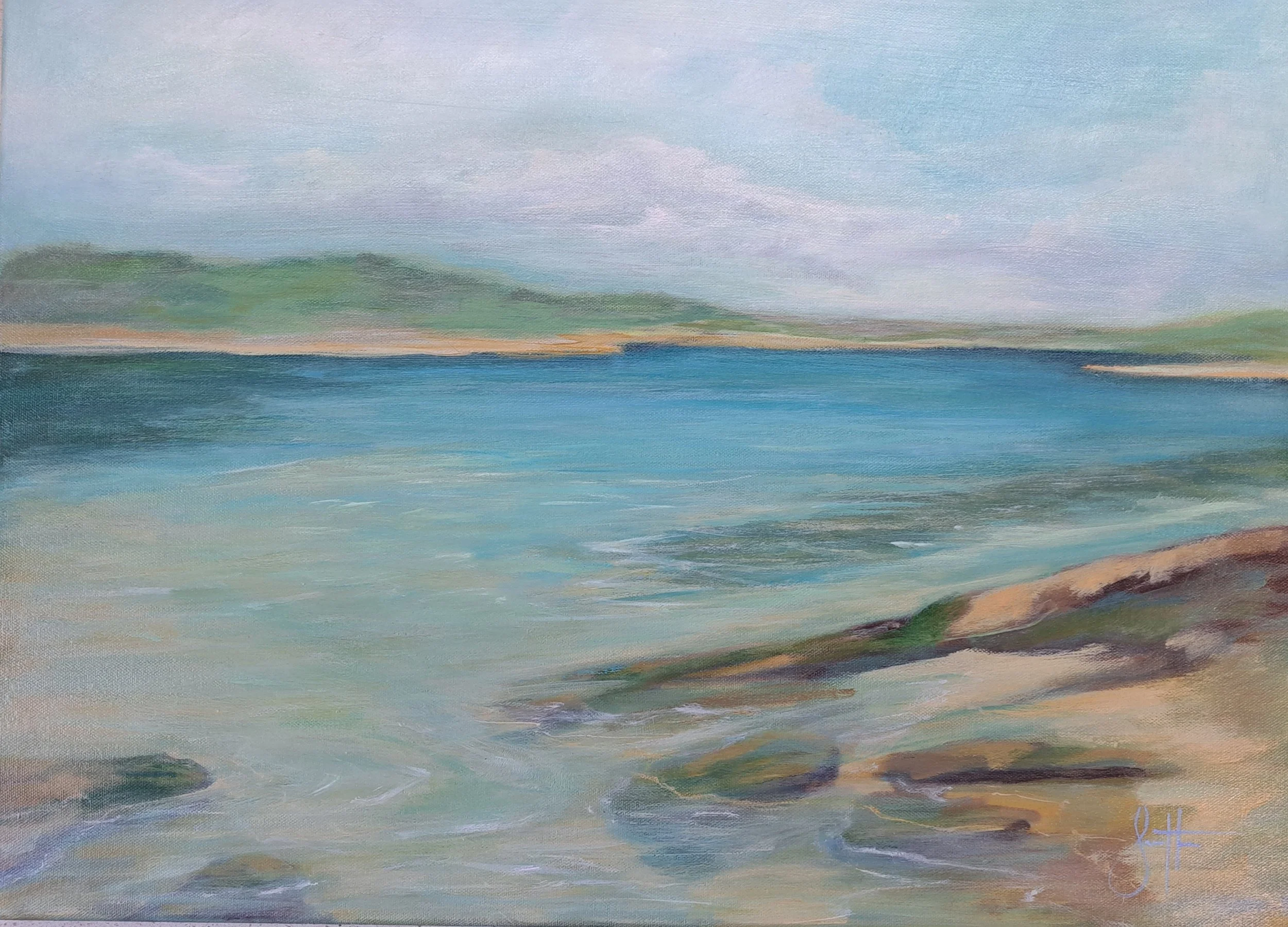 Floating/ bay view with aqua shallows and rocks evoking calm clear waters