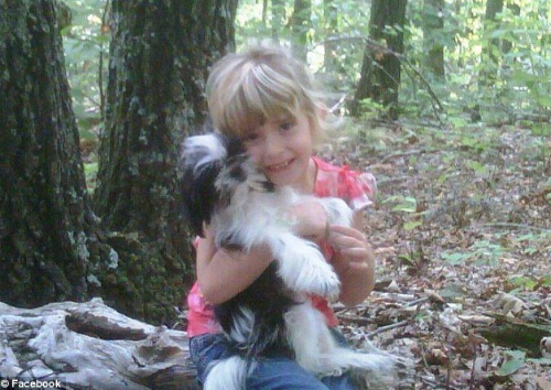 Madyson with Maisy the dog.