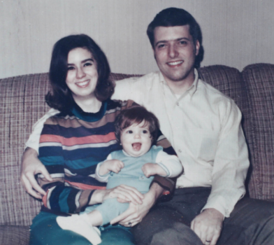 Lori as a baby with her parents.
