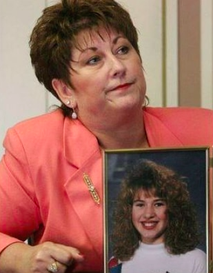 Jackie, Shanda’s mother, with Shanda’s picture