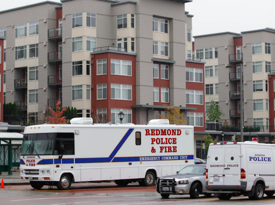 Police vehicles parked outside of Julia, Maile and Sky’s apartment building in Redmond, WA the day after Sky went missing (source: CBS News)