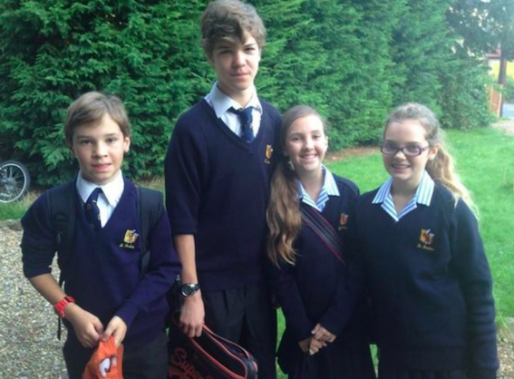 Breck and triplets Sebastian, Chloe and Carly (source: mirror.co.uk)