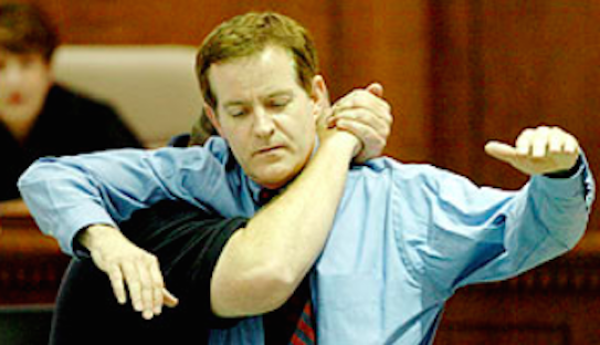 During the trial, a law enforcement trainer demonstrated on prosecutor Morley Swingle the type of chokehold used on Jesse by Steven Rios (source: Murderpedia)
