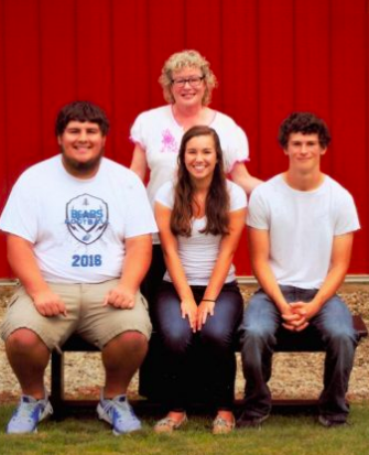 Jake, Mollie, Scott and mom, Laura (source: The Daily Iowan)