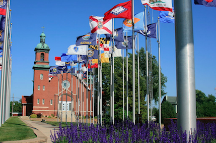 Display of flags in downtown Brooklyn. The city bills itself as “The Community of Flags” (source: Wikipedia)