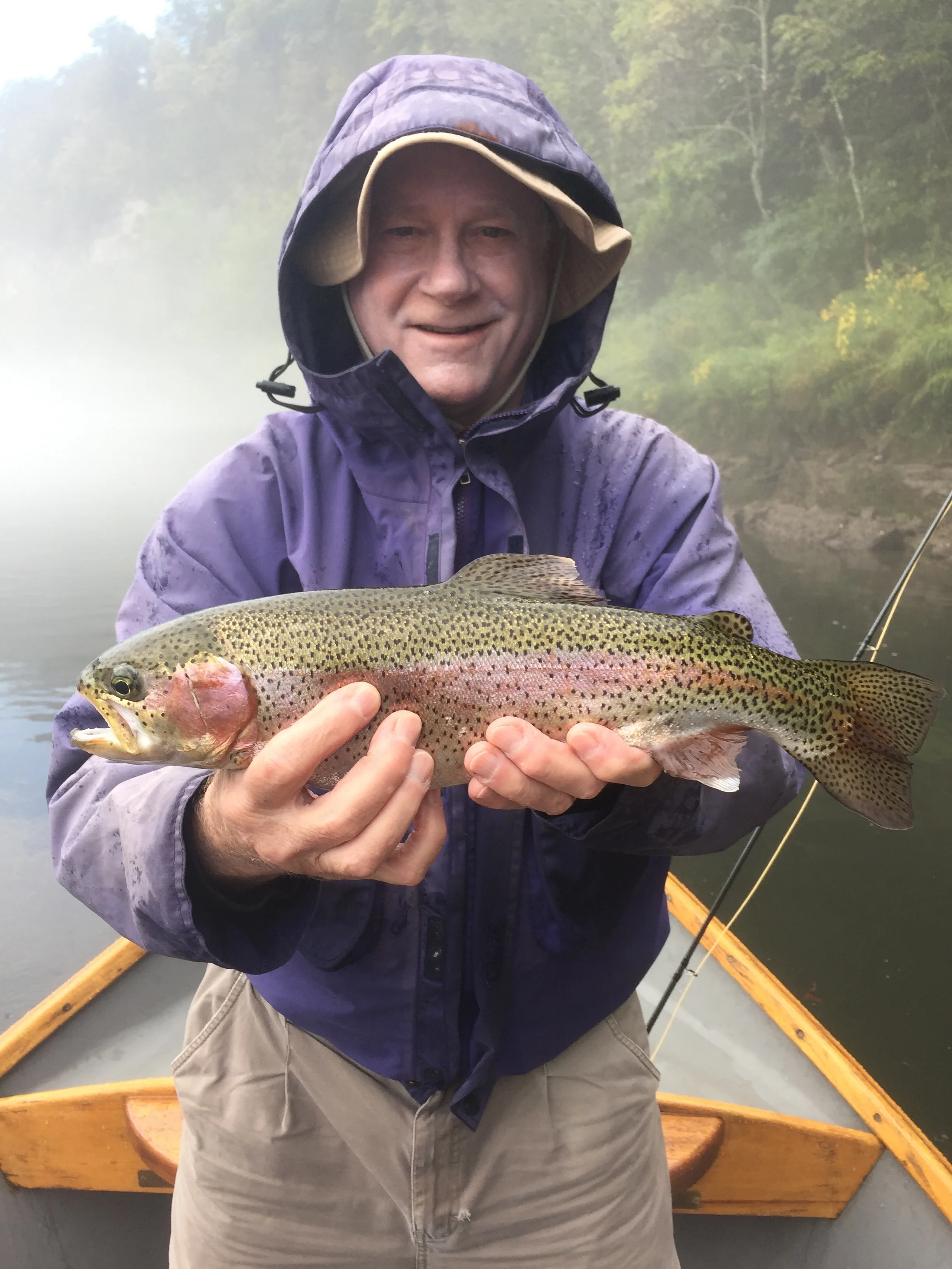  Stanley T. Wonn, Esq., (aka Dad) and a dandy topwater bow in the rain 