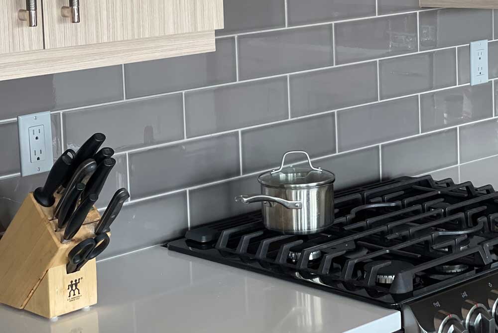 Petula-Design-Kitchen-Tile-and-Stove-Design.jpg
