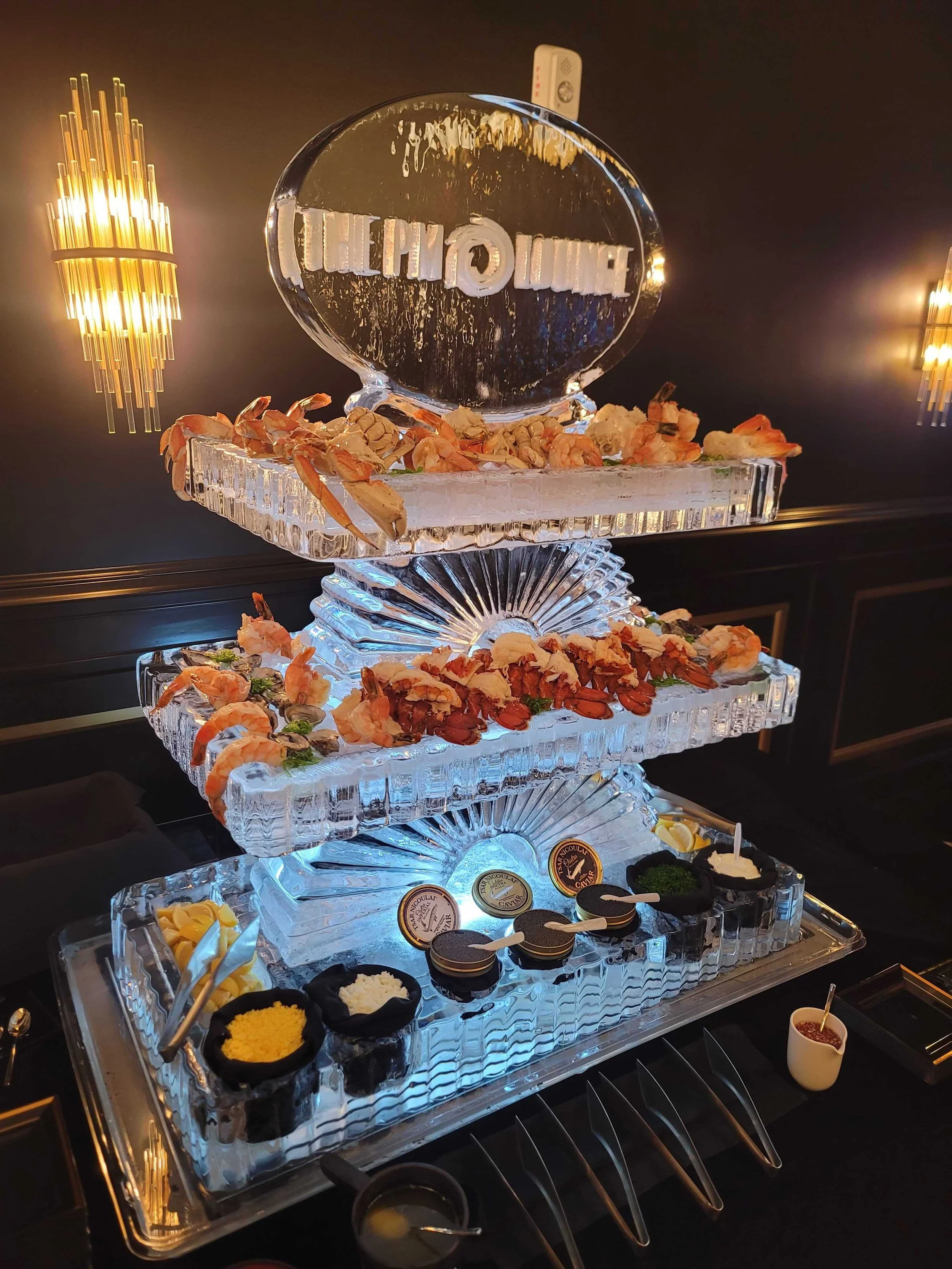 Three Tiered Seafood Display with Oval Logo Ice Sculpture.jpg