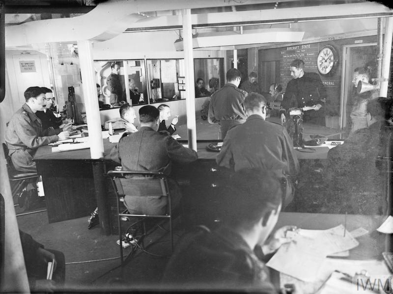 Scene in the operations room of HMS HILARY off Sicily at dawn of the first day of the invasion of the island. 9-10 Ju.jpg