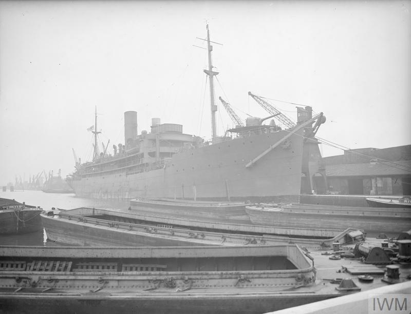 HMS HILARY lying in the basin 31 MARCH 1942, SURREY DOCKS, LONDON..jpg