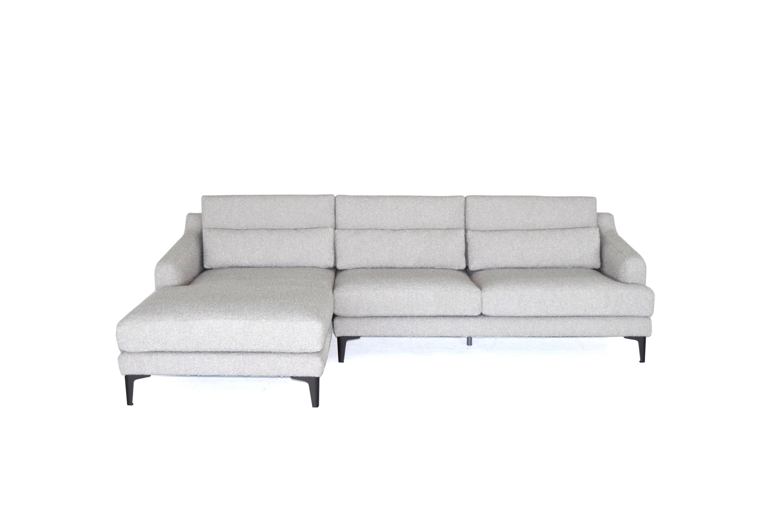 Detailed view of Reina luxury sofa from the front angle