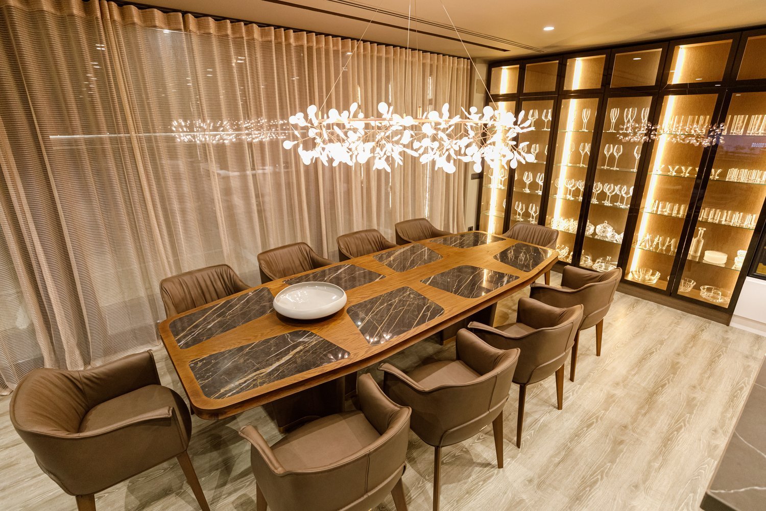 Greg dining room chairs display in a luxury dining room area