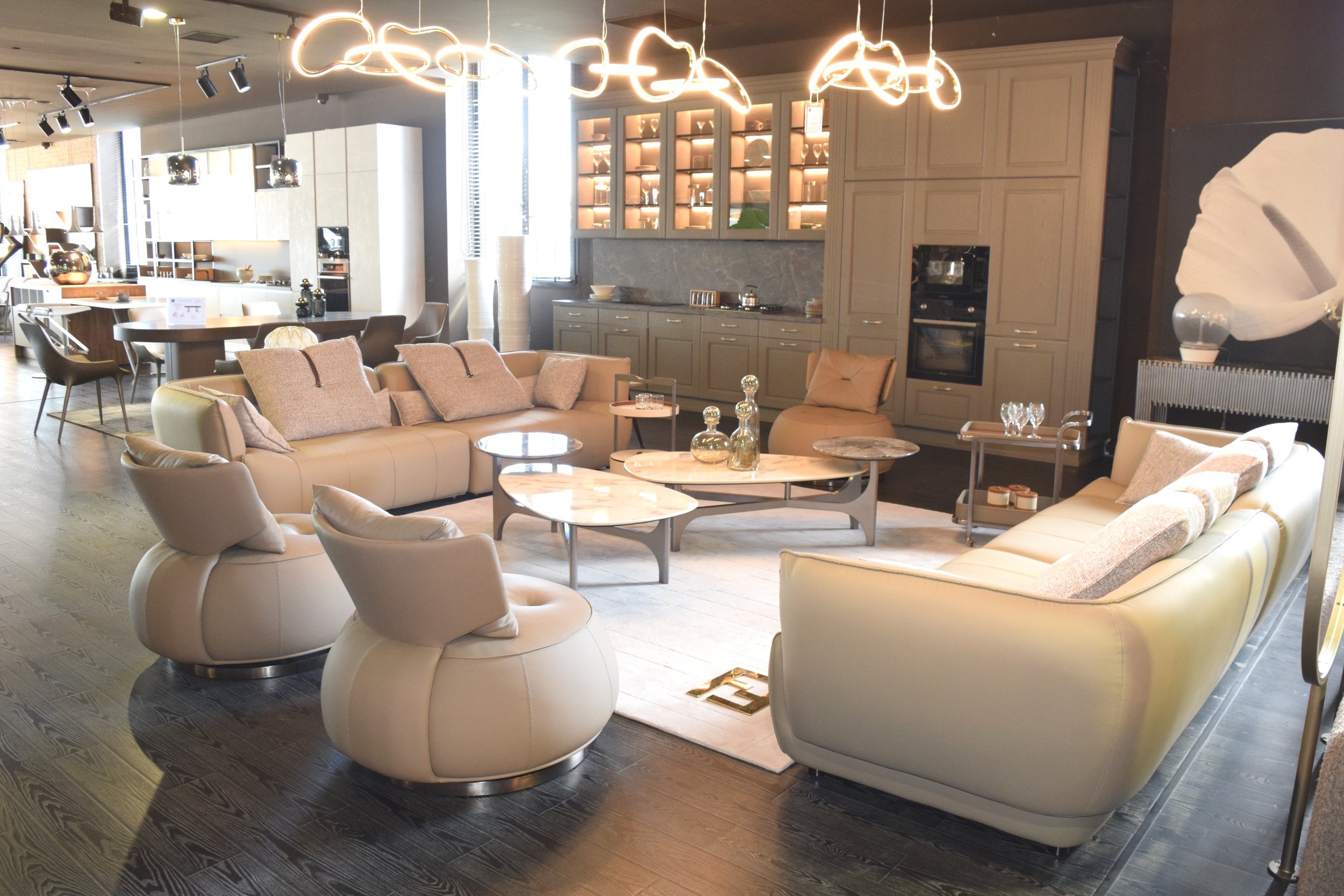 Side angle showing the Allure leather three-seater sofa