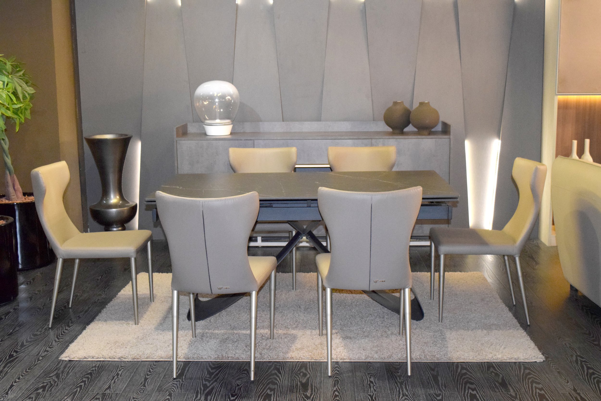 Dolce wing back dining room chairs in a luxury space