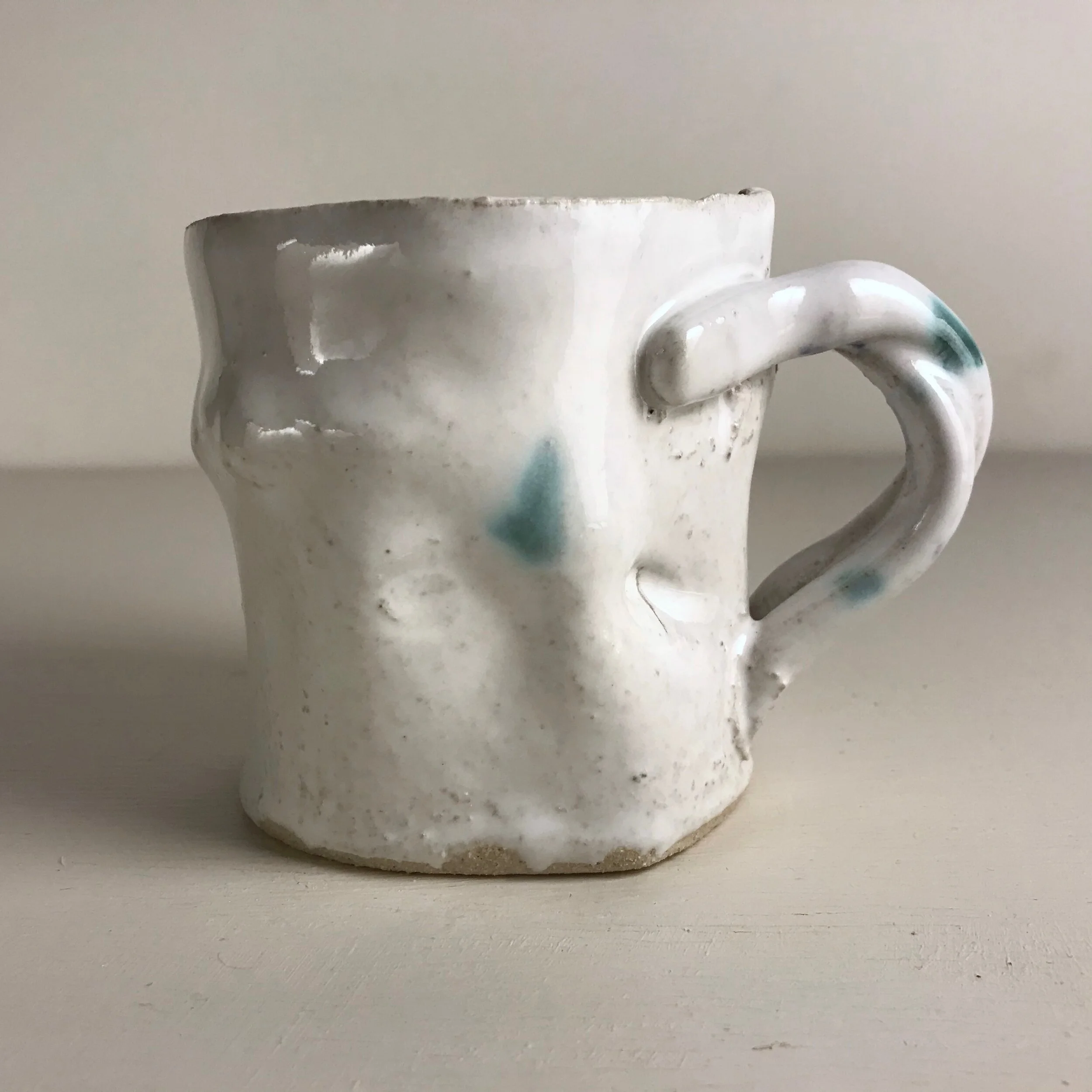 White Cup with Intertwined Handle