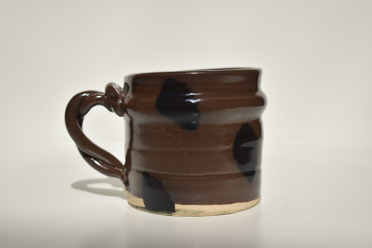 Red Cup with Black Marks