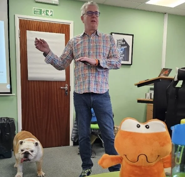  Teaching positive psychology to the team at Arrow Valve in Berkhamsted, UK. That’s Winston, the factory mascot on the left, keeping Bill’s audience in line. 