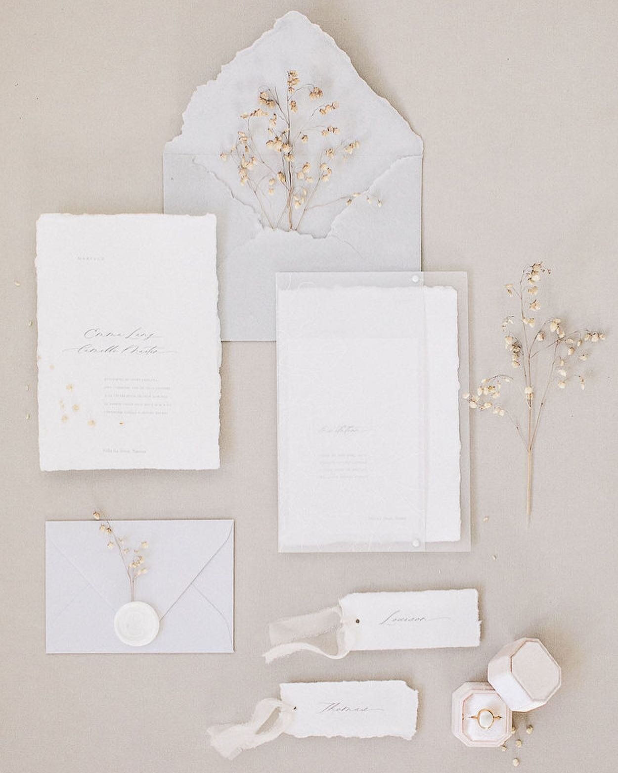 Flatlays of the beautiful invitation suite from @myne_creation and others details from our white etheral editorial featured in @weddingsparrow
.
Wedding accessories from @gibsonbespoke 
Antique Pearl ring from @hemingwayfineartstudio 
.

Photographer
