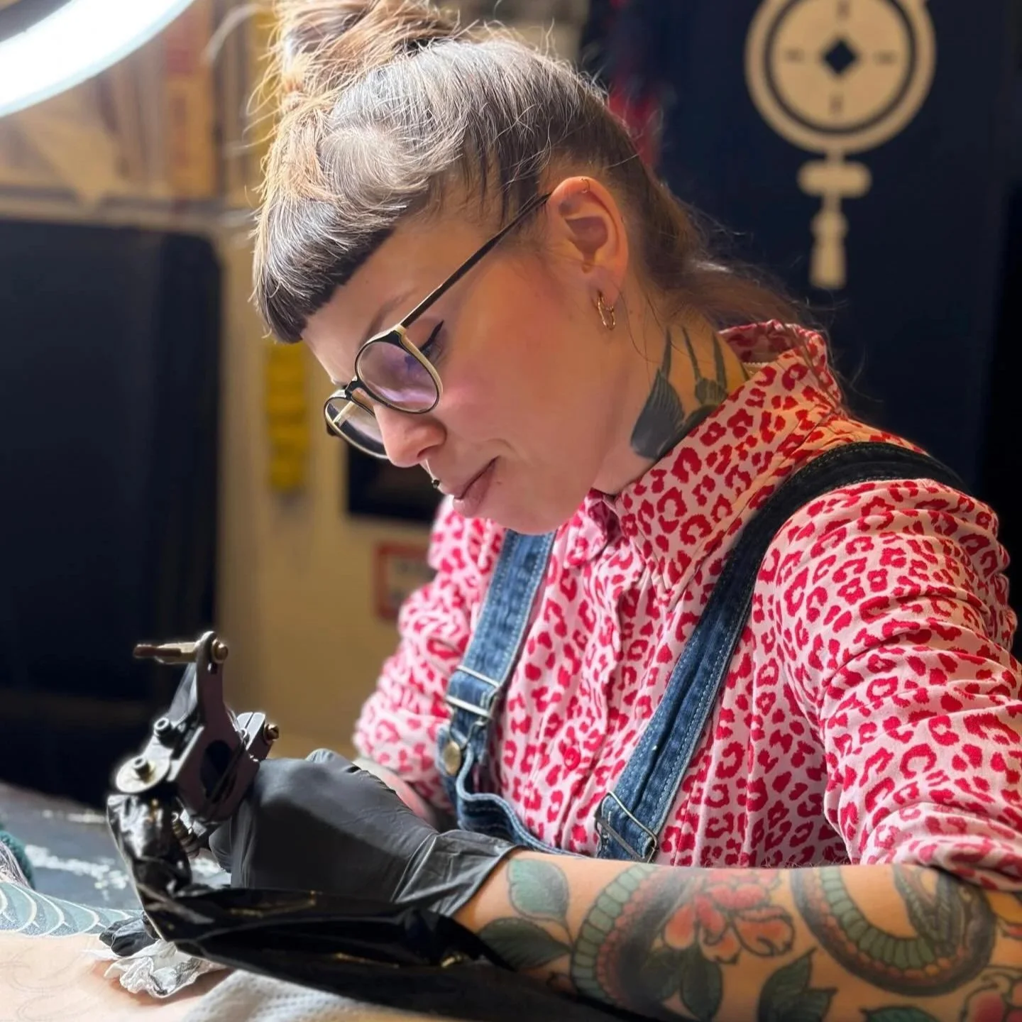 Person being tattooed at Red Point Tattoo in London