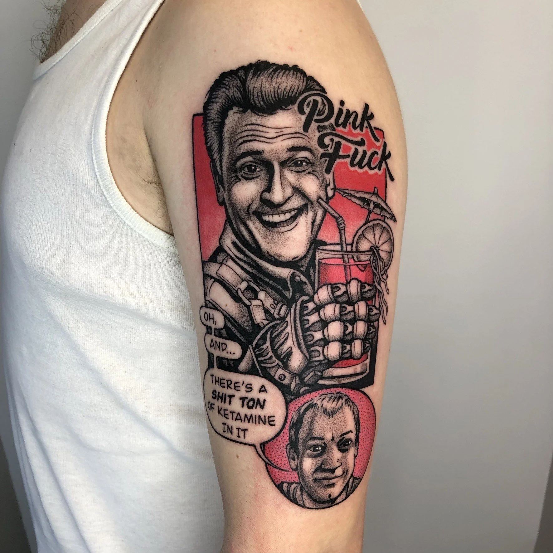 Comic book style arm tattoo
