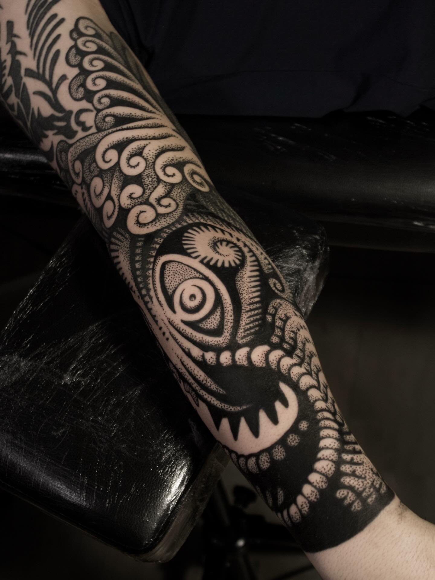 Abstract blackwork sleeve tattoo