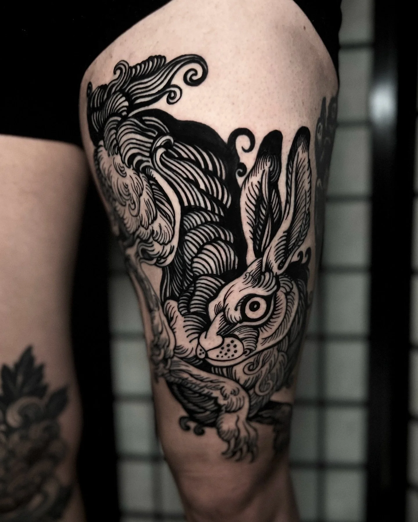 Blackwork hare tattoo at Red Point Tattoo in North London