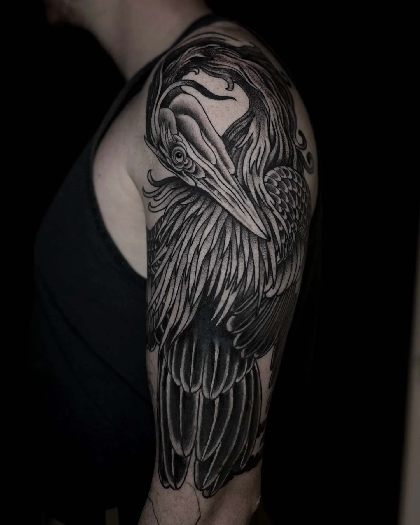 Heron arm and shoulder tattoo from Red Point Tattoo in Islington