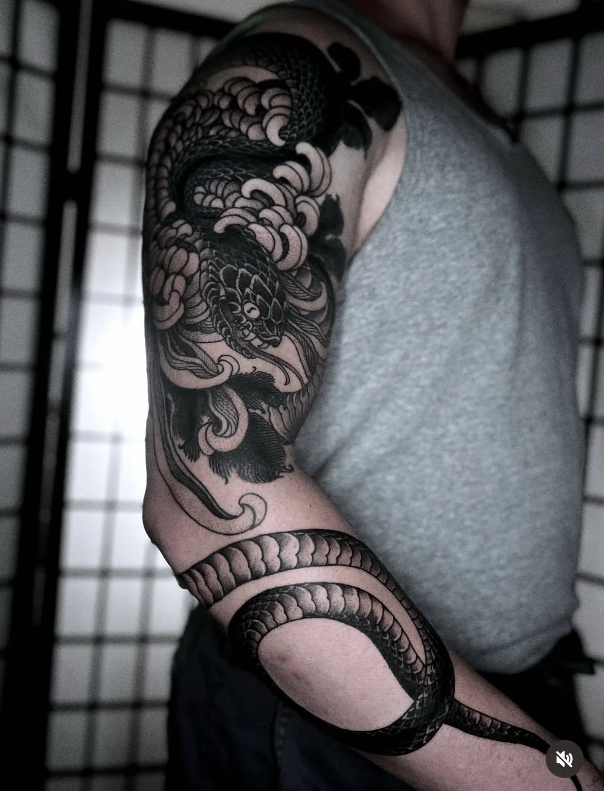Snake and chrysanthemums sleeve  by @lukey.wolf for info &amp; bookings 📩 wolfietattooer@gmail.com
&bull;
&bull;
&bull;
#blackworktattoo #snaketattoo #lukeywolf
