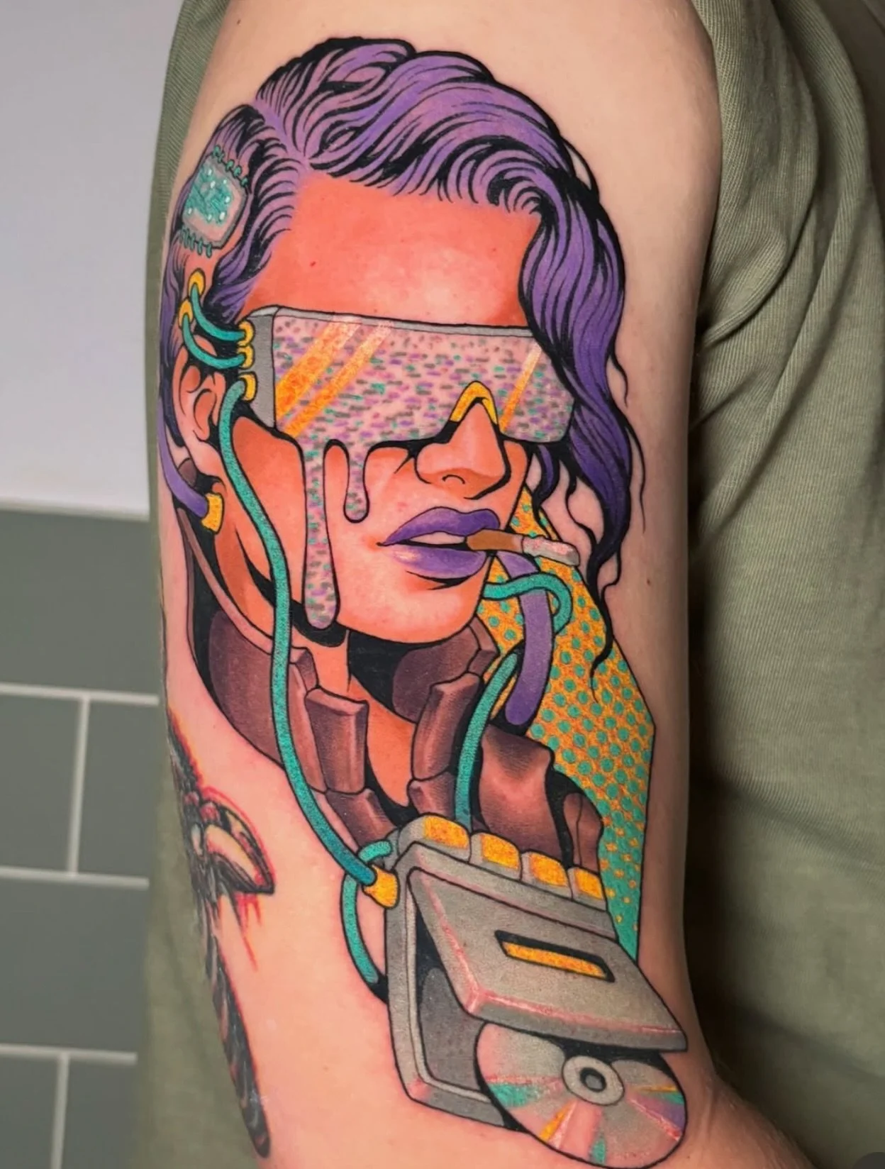 Cyber lady with mini disk player by @clarawelshtattoos for info &amp; bookings 📩 info@redpointtattoo.com 
.
.
.
#clarawelshtattoos #colourtattoo #londontattoo