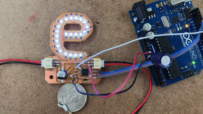 modified sketch that has lights constantly on and flashes when there is capcitive touch